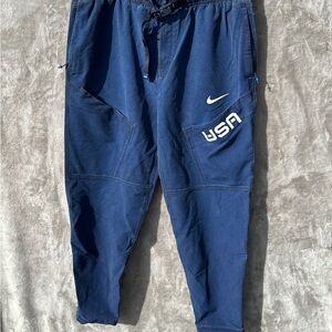 Nike USA Olympic Team Joggers Navy Blue Athletic Pants Zip Pockets woman’s SZ XL